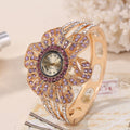 Fashion Crystal Flower Shape Dial Hollow Metal Strap Women Quartz Watch